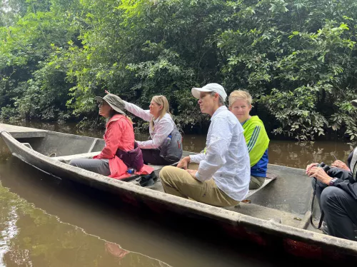 Machu Picchu tour for small groups. Travelers in canoe at Inkaterra Reserva Amazonica.